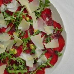 CARPACCIO with Grana Padana shavings, Roquet, Balsamic dressing